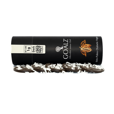 Goalz sugar-free chocolate box is laid horizontally next to keto chocolate barks with coconut flakes