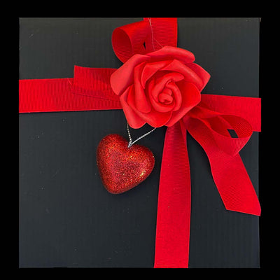 Black Gift box with red Ribbon decorated with red Rose and red heart  Edit alt text